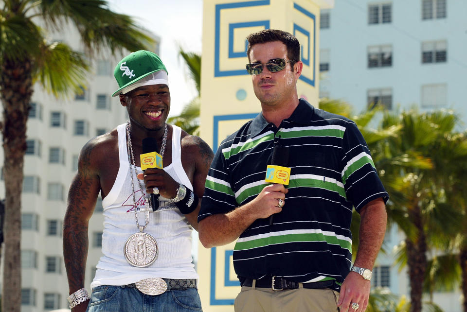 Rapper 50 Cent and host Carson Daly appear during a taping for "MTV Spring Break 2003" at the Surfcomber Hotel March 12, 2003.