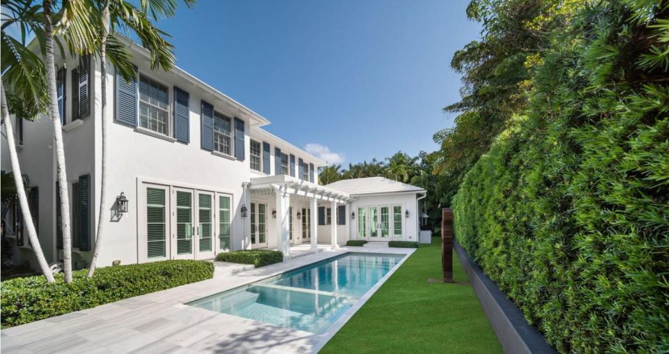 The rear of a just-sold house at 154 Atlantic Ave. in Palm Beach faces a lap pool. The seller bought the house new shortly after it was completed in 2020.