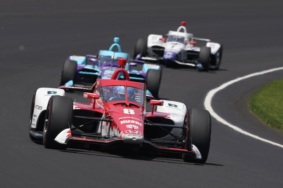 Marcus Ericsson, of Sweden, drives into the first turn during the Indianapolis 500 auto race at Indianapolis Motor Speedway, Sunday, May 29, 2022, in Indianapolis. (AP Photo/Darron Cummings)