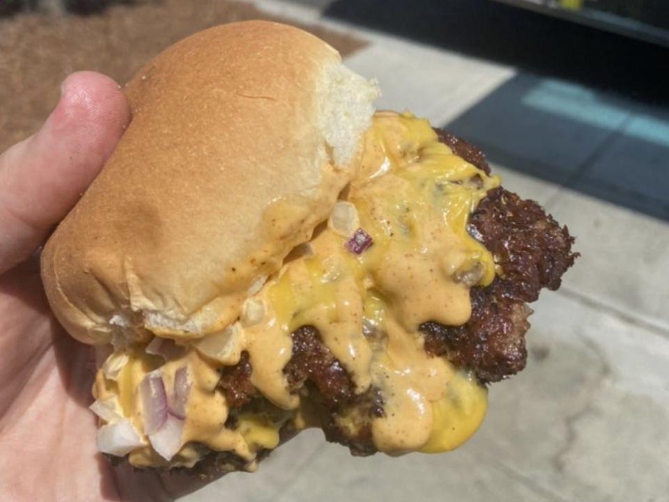 A cheeseburger with a smashed patty.