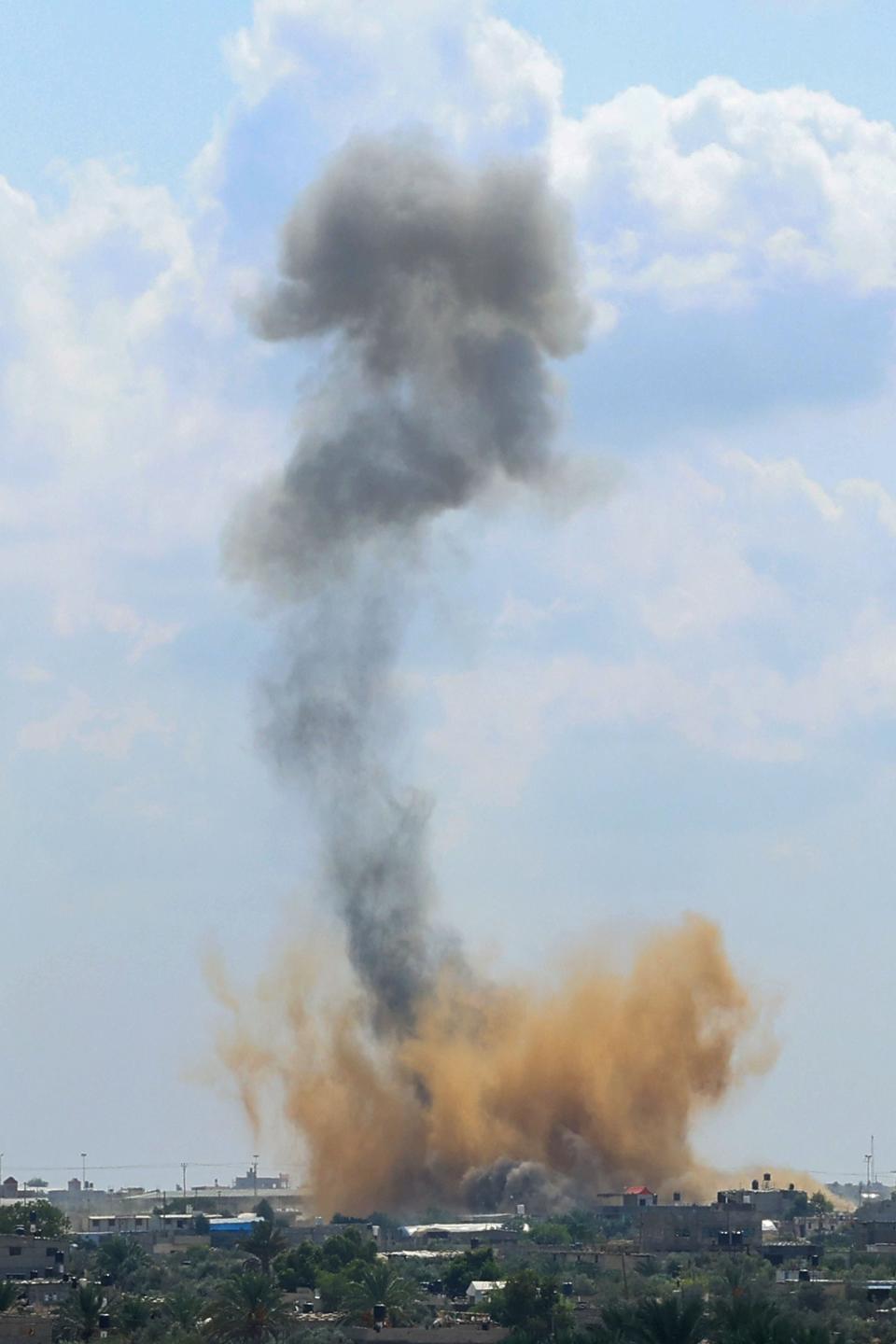 Smoke billows from the Gaza’s Rafah border crossing with Egypt during an Israeli airstrike (AFP via Getty Images)