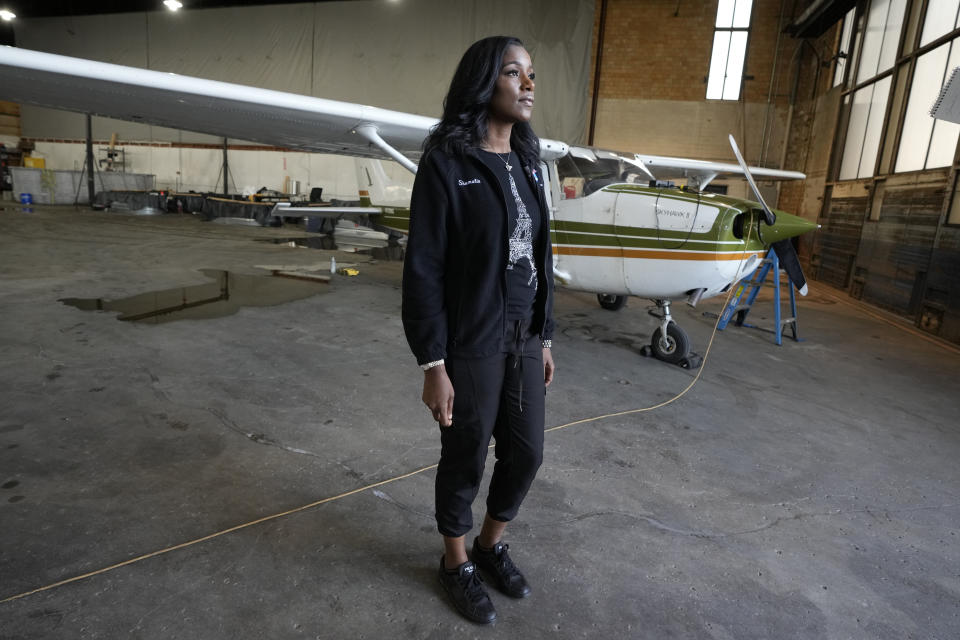 Shamalia Willis, community outreach coordinator and director of the programs at the Tuskegee Airmen National Museum, is photographed, Thursday, Aug. 17, 2023 at the Coleman A. Young airport in Detroit. The museum operates a program that teaches young people how to fly, while exposing them to careers in aviation and as pilots. (AP Photo/Carlos Osorio)
