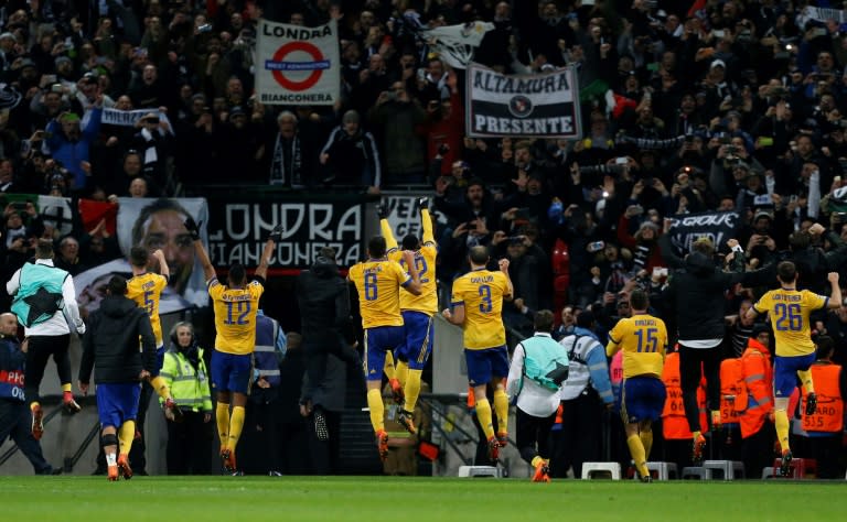 Juventus players celebrate in front of their supporters beating Tottenham 2-1 at Wembley, 4-3 on aggregate