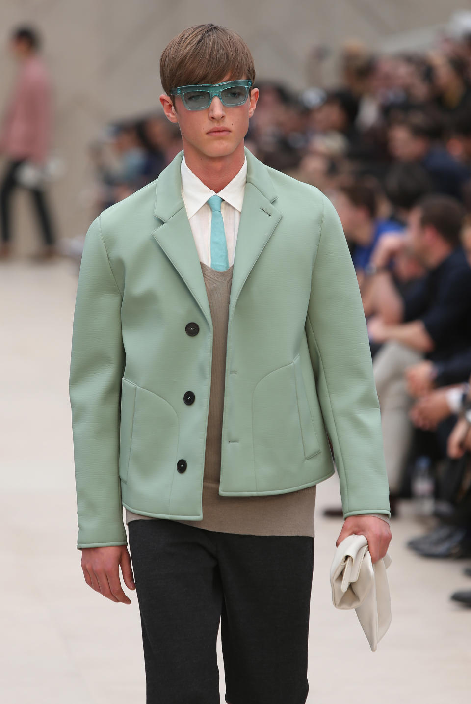 A model wears a creation by Burberry during London Men's spring summer fashion collections 2014, in London, Tuesday, June 18, 2013. (Photo by Joel Ryan/Invision/AP)