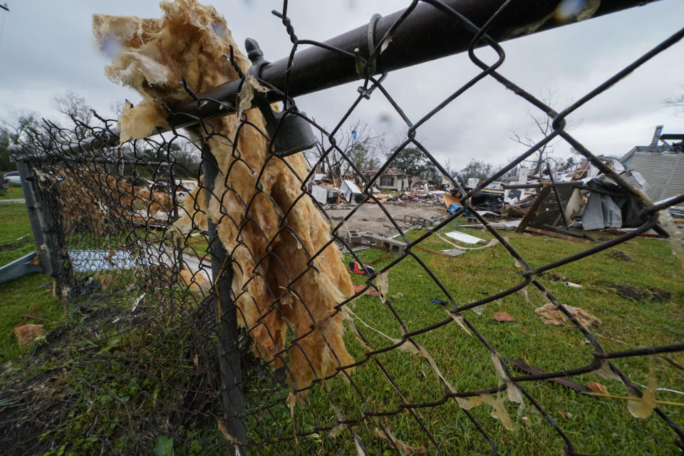 Destruction is seen from a tornado that tore through the area in Killona, La., about 30 miles west of New Orleans in St. James Parish, Wednesday, Dec. 14, 2022. (AP Photo/Gerald Herbert)