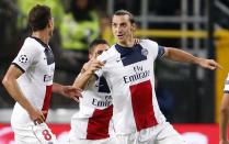 Paris Saint-Germain's Zlatan Ibrahimovic (R) celebrates after scoring against Anderlecht during their Champions League soccer match at Constant Vanden Stock stadium in Brussels October 23, 2013. REUTERS/Francois Lenoir (BELGIUM - Tags: SPORT SOCCER)