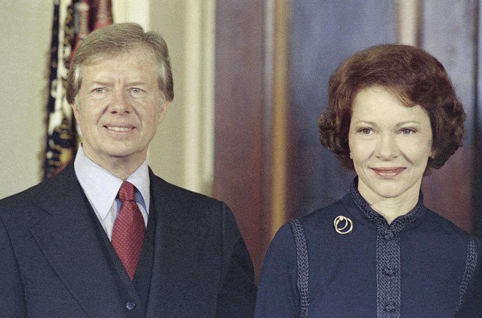 FILE - President-elect Jimmy Carter, left, with his wife, Rosalynn Carter, Dec. 3, 1976. Rosalynn Carter, the closest adviser to Jimmy Carter during his one term as U.S. president and their four decades thereafter as global humanitarians, died Sunday, Nov. 19, 2023. She was 96. (AP Photo/Charles Harrity, File)