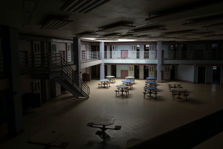 <span class="caption">Trans and non-binary prisoners were isolated even before the pandemic began.</span> <span class="attribution"><a class="link " href="https://www.shutterstock.com/image-photo/light-skylight-into-common-area-abandoned-1085613473" rel="nofollow noopener" target="_blank" data-ylk="slk:karenfoleyphotography/Shutterstock;elm:context_link;itc:0;sec:content-canvas">karenfoleyphotography/Shutterstock</a></span>