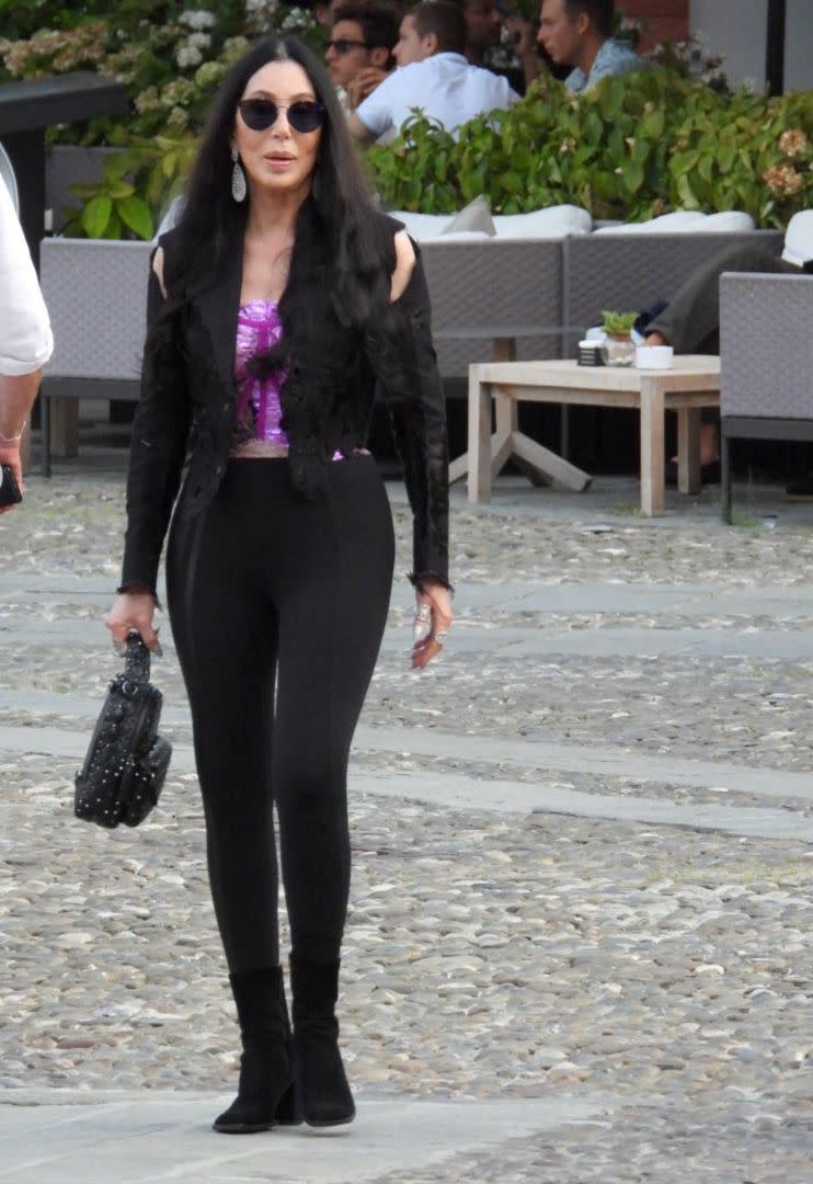 Cher is seen out for a walk with friends in Portofino, Italy, July 18. - Credit: Oliver Palombi/MEGA