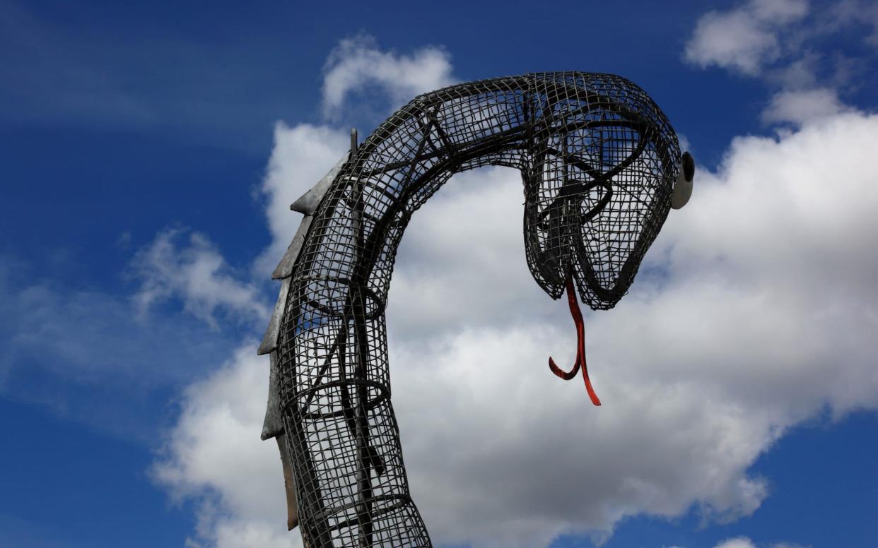 Nessie sculpture in Loch Ness - Getty Images Contributor