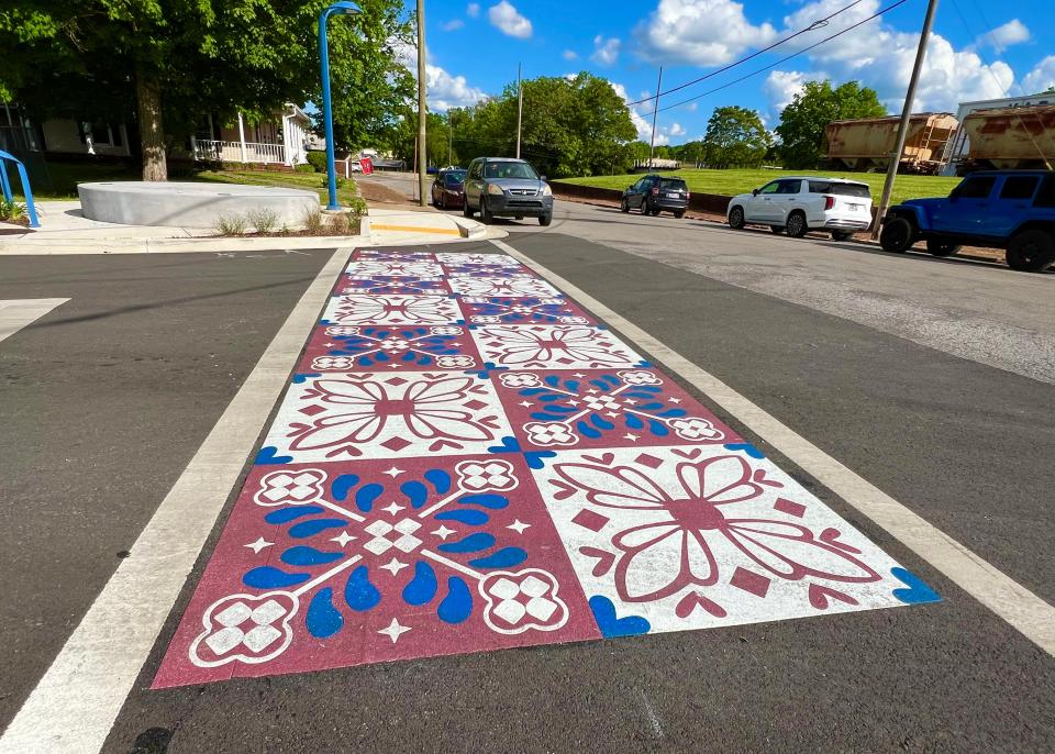 Columbia's new artistic crosswalk, located in the Columbia Arts District at the intersection of South Garden and Depot Streets, was recently unveiled. The crosswalk was designed and completed by local artist Whitney Herrington.