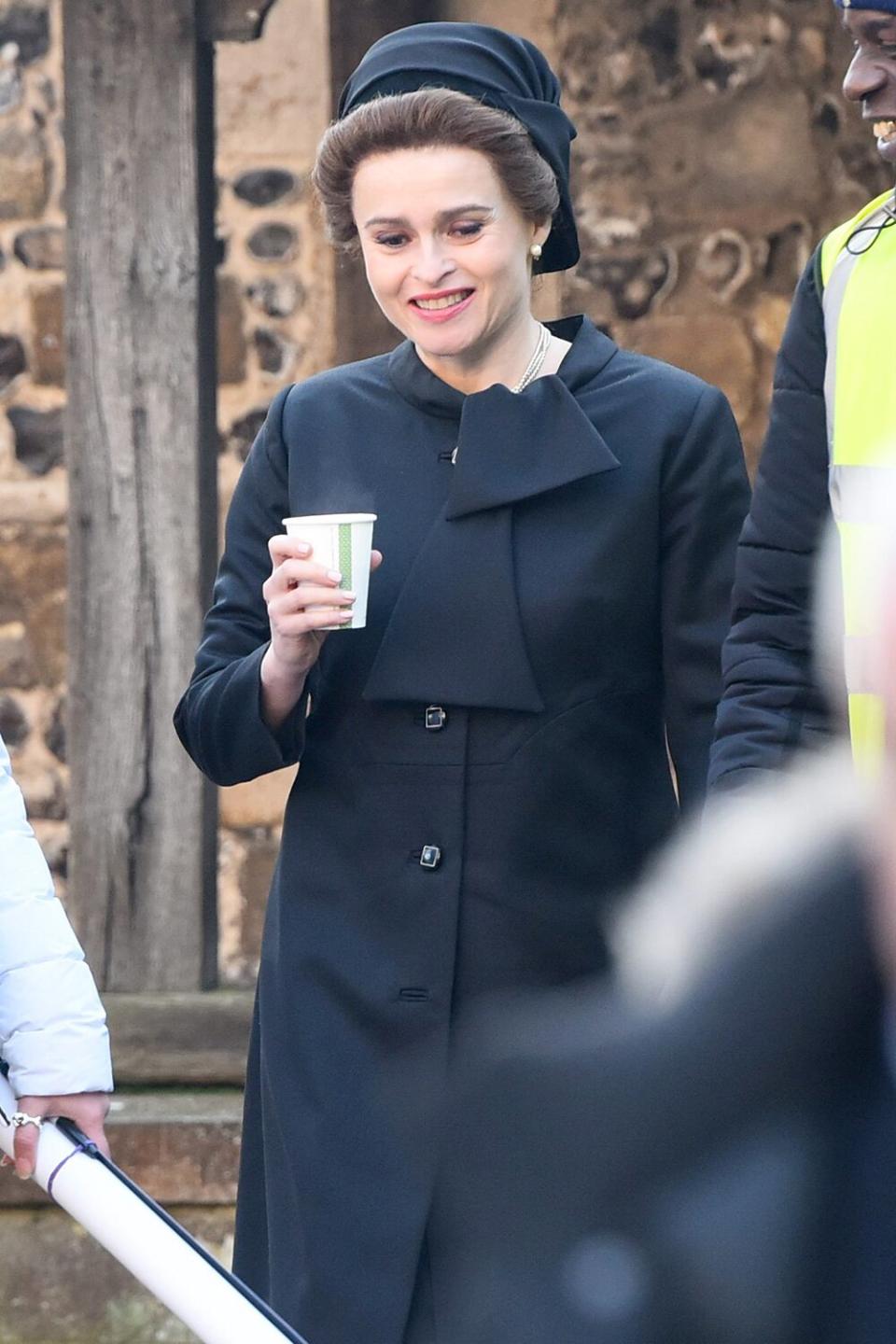 Helena Bonham Carter films scenes for season 4 of <i>The Crown</i> near Winchester Cathedral on Tuesday in Winchester, England.