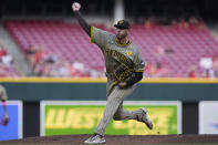 San Diego Padres starting pitcher Joe Musgrove throws to a Cincinnati Reds batter during the first inning of a baseball game Tuesday, May 21, 2024, in Cincinnati. (AP Photo/Carolyn Kaster)