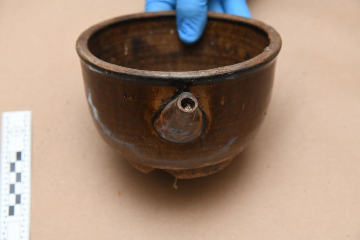 A small bowl was among the Okinawan items that had been lost to history for about 80 years after they were plundered from Japan. It's a mystery how they ended up in the attic of a WWII veteran who did not serve in the Pacific theater.