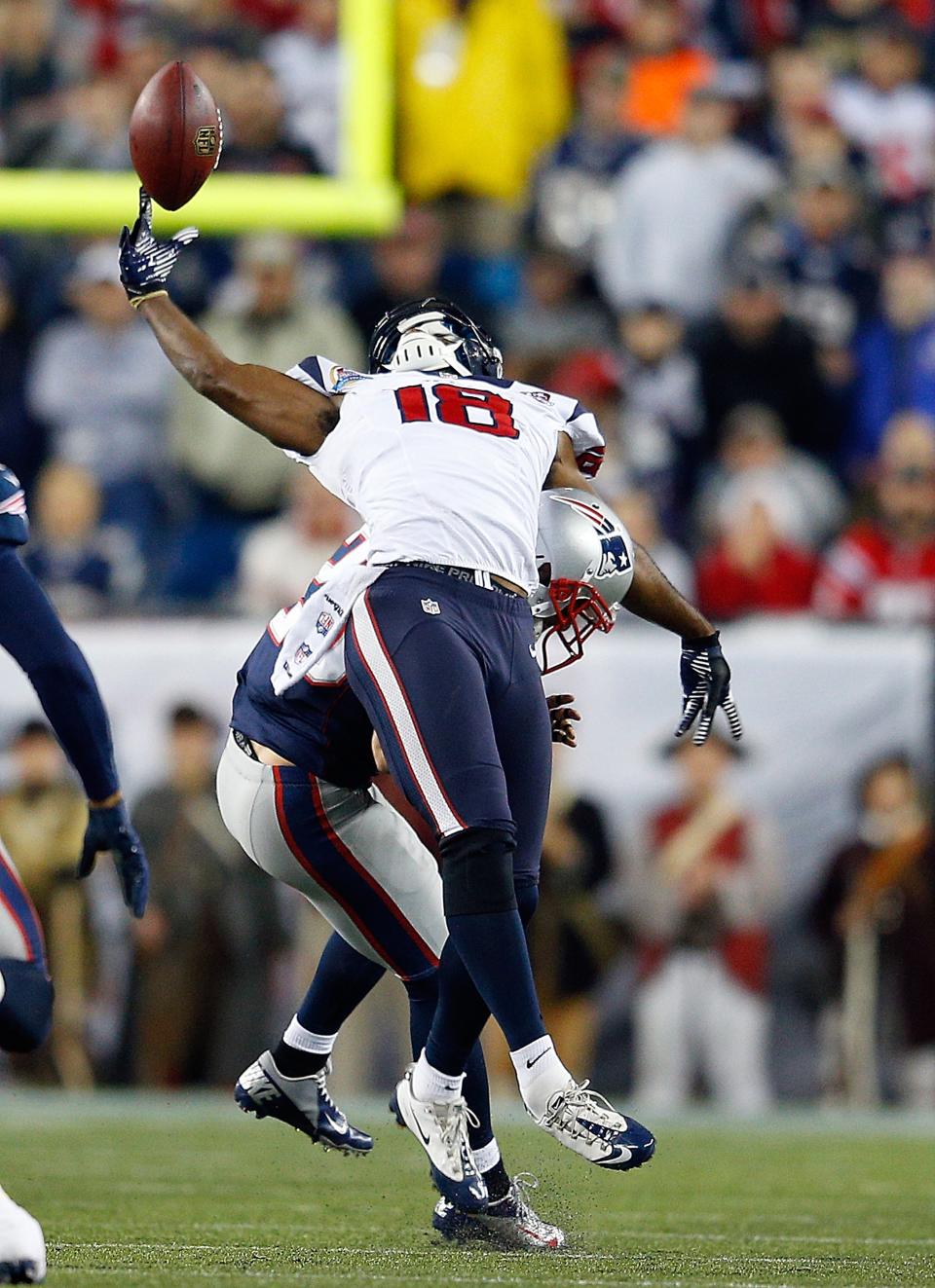 Steve Gregory #28 of the New England Patriots breaks up a pass intended for Lestar Jean #18 of the Houston Texans in the first half at Gillette Stadium on December 10, 2012 in Foxboro, Massachusetts. (Photo by Jim Rogash/Getty Images)