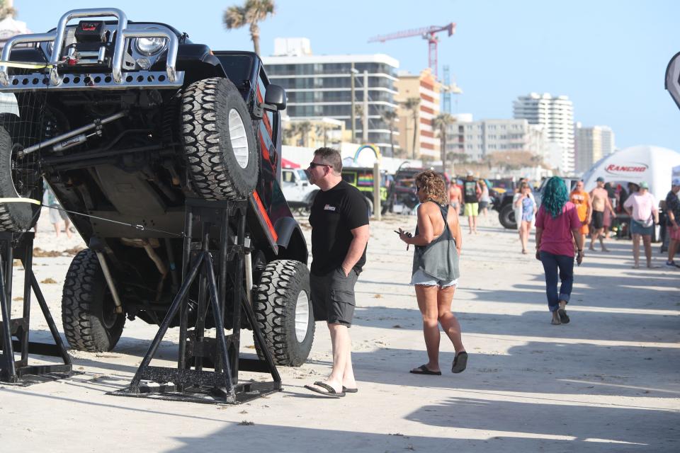Jeep enthusiasts check out the displays on the beach behind the Hard Rock Hotel in Daytona Beach at the "Jeeps at the Rock" event. The two-day Hard Rock event, which continues on Thursday, is part of the weeklong Jeep Beach celebration in Daytona Beach.