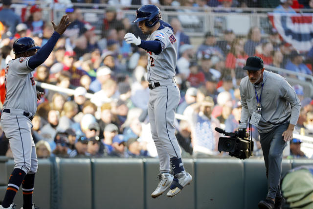 Astros pound 4 homers, with a pair by Abreu, to rout Twins 9-1 and take 2-1  ALDS lead –