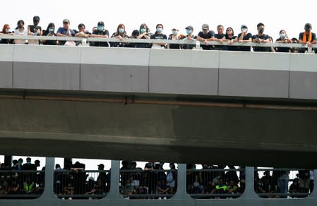 Demonstrators attend a protest in Hong Kong