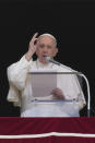 Pope Francis delivers his blessing during the Angelus noon prayer from the window of his studio overlooking St.Peter's Square, at the Vatican, Sunday, June 13, 2021. Francis demanded during his speech for humanitarian aid to reach residents of the war-torn Tigray region of northern Ethiopia, where Ethiopian and Eritrean soldiers are blocking food and other assistance. (AP Photo/Andrew Medichini)