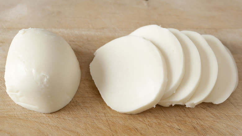 Fresh mozzarella on wooden board