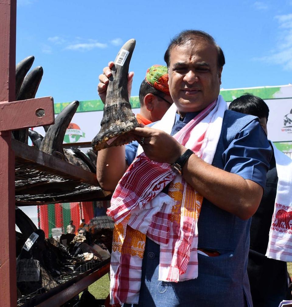 <div class="paragraphs"><p>Chief Minister of Assam Himanta Biswa Sarma poses with a rhino horn</p></div>