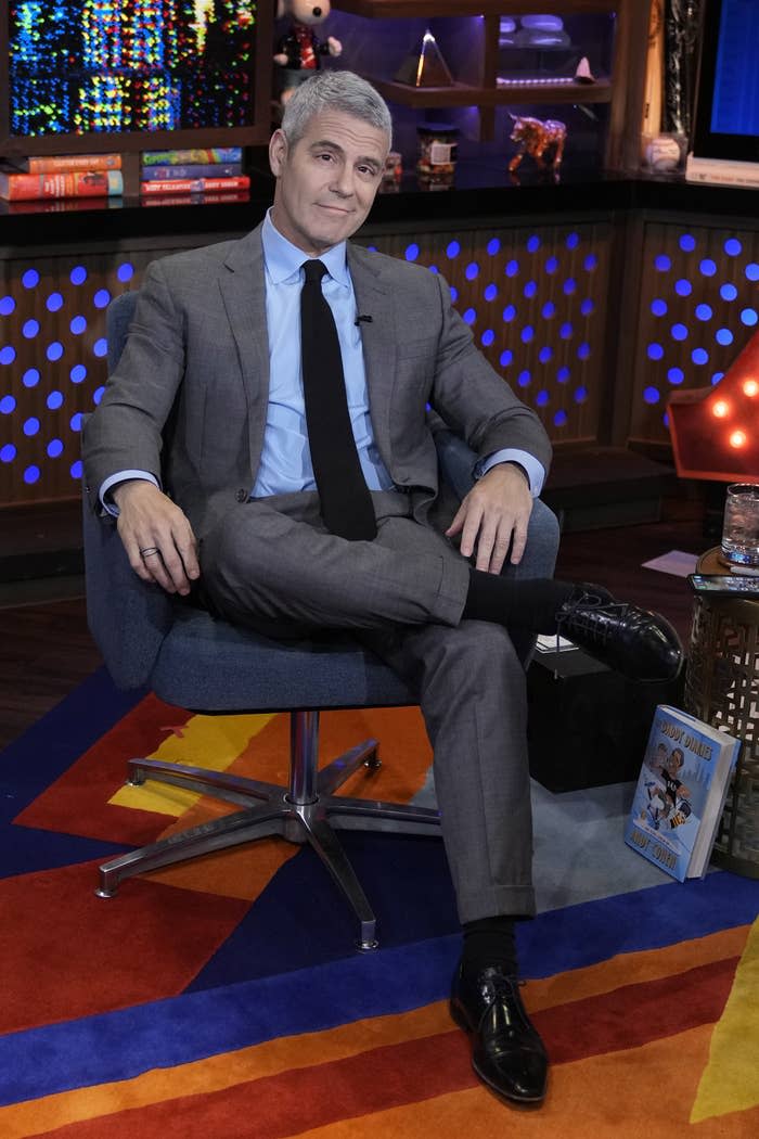 Andy Cohen in his hosting seat for Watch What Happens Live