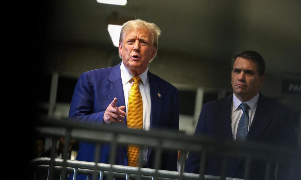 <span>Donald Trump speaks to reporters at the end of the day of his criminal trial on 2 May.</span><span>Photograph: Charly Triballeau/Reuters</span>