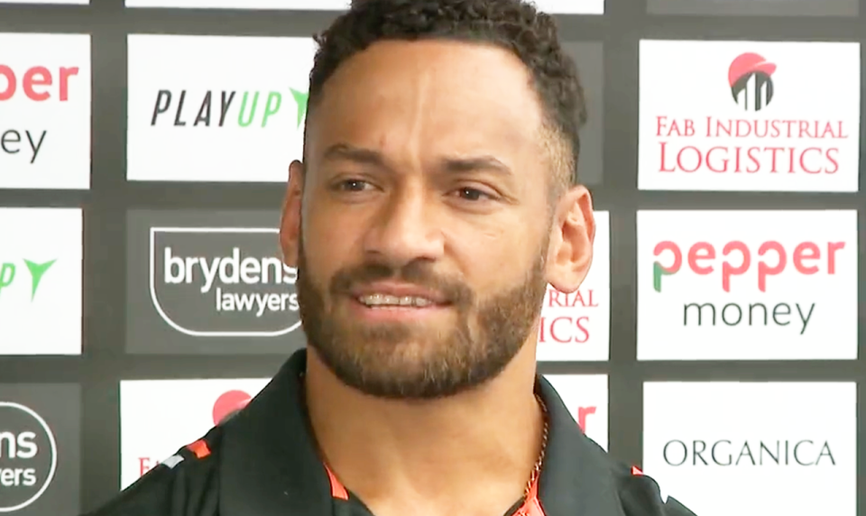 Wests Tigers captain Api Koroisau (pictured) speaking to the media.