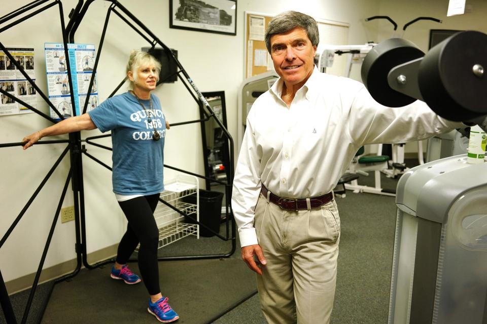 Wayne Westcott in the Quincy College Health and Fitness Center in 2018. Rita La Rosa Loud, director of the center, is at left.