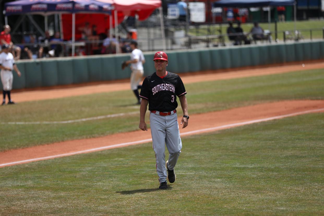 Southeastern coach Adrian Dinkel is the NAIA Coach of the Year.