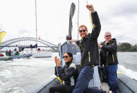 <p>Harry and Meghan watch the sailing trials during the Invictus Games in Australia (Getty) </p>