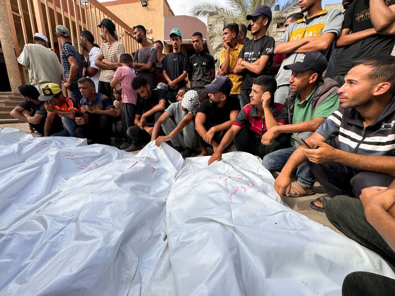 Gazans mourn Palestinians killed in an Israeli strike, in Khan Younis, in the southern Gaza Strip