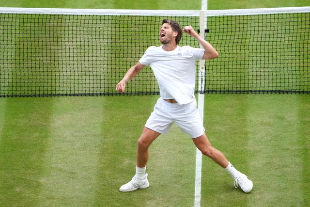 Cameron Norrie celebrates bearing Tommy Paul 