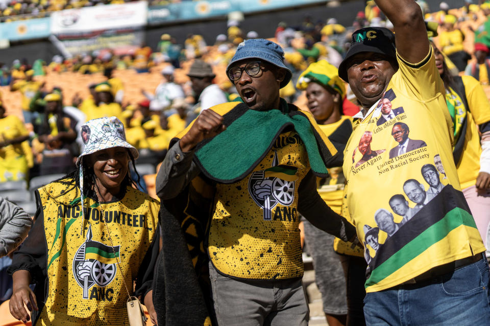 African National Congress supporters wait for South African President Cyril Ramaphosa to arrive at the Siyanqoba rally at FNB stadium in Johannesburg, South Africa, Saturday, May 25, 2024. South African will vote in the 2024 general elections on May 29. (AP Photo/Jerome Delay)