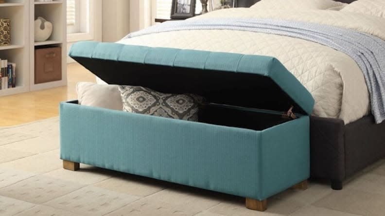 Stash extra pillows and blankets in this pretty storage bench.