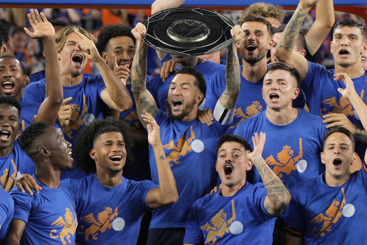 Luciano Acosta of FC Cincinnati celebrates winning the Supporter's Shield with teammates on Oct. 4 at TQL Stadium in Cincinnati. (Photo by Jeff Dean/Getty Images)