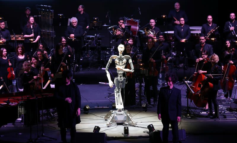 A robot maestro leads an orchestra at the Sharjah Performing Arts Academy in Sharjah