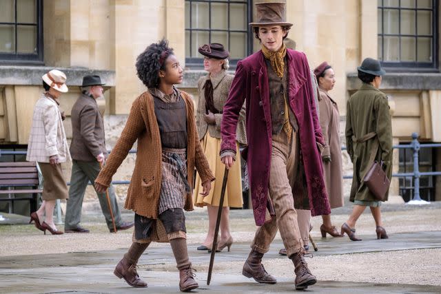 <p>Courtesy of Warner Bros. Pictures</p> Calah Lane as Noodle and Timothée Chalamet as Willy Wonka in Wonka.