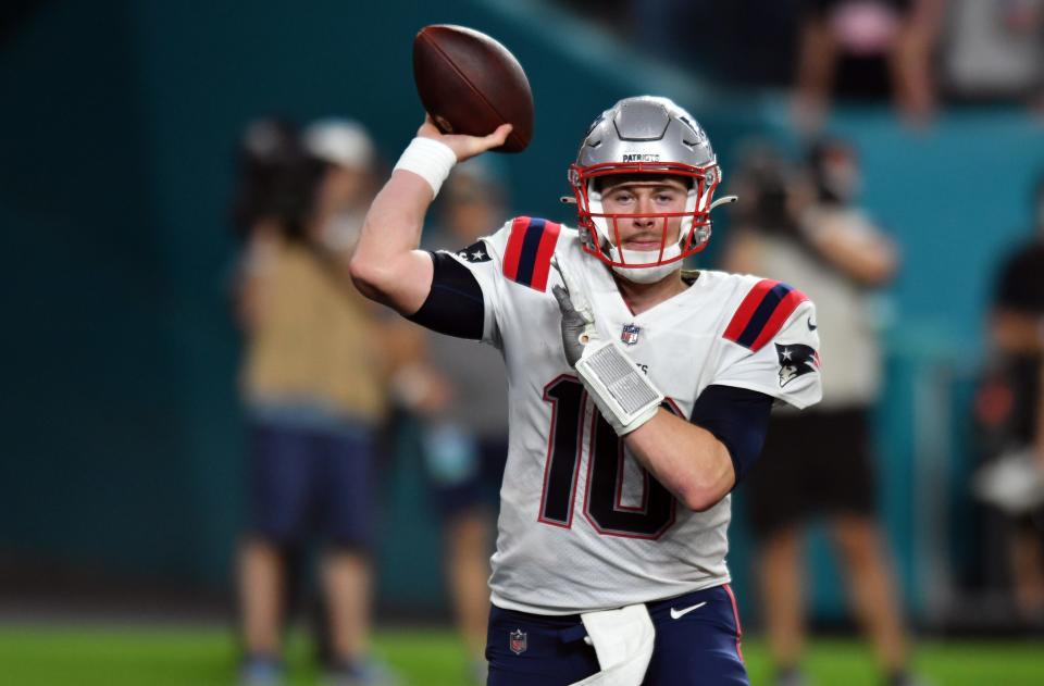 Patriots quarterback Mac Jones prepares to pass on the last play of the game against the Miami Dolphins at Hard Rock Stadium on Jan. 9.