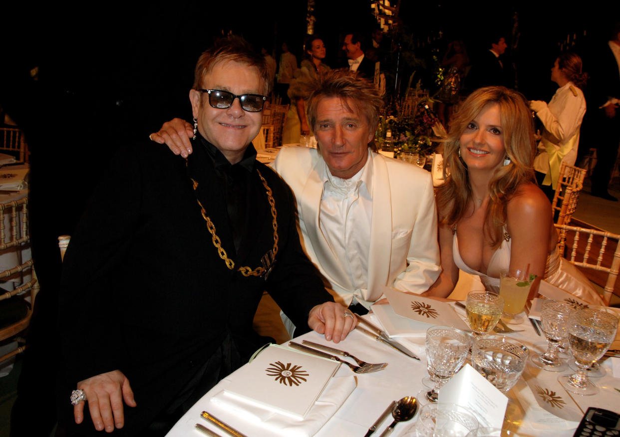 LONDON - JUNE 02:  (EMBARGOED FOR PUBLICATION IN UK TABLOID NEWSPAPERS UNTIL 48 HOURS AFTER CREATE DATE AND TIME. NO UK MAGAZINES)  (L-R) Sir Elton John, Rod Stewart and Penny Lancaster attend the Raisa Gorbachev Foundation Party at Stud House, Hampton Court Palace on June 2, 2007 in Richmond upon Thames, London, England. The night is in aid of the Raisa Gorbachev Foundation - an international fund fighting child cancer.  (Photo by Dave M. Benett/Getty Images)