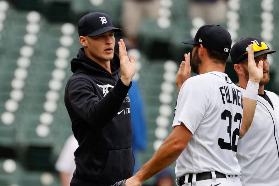 Detroit Tigers starting pitcher Matt Manning (25) and starting pitcher Michael Fulmer (32) celebrate after defeating the St. Louis Cardinals June 23, 2021 at Comerica Park.