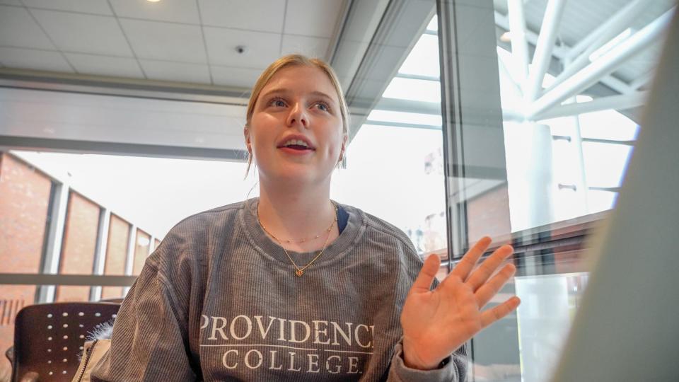 Caroline Austin, a Providence College sophomore, has been attending Friars basketball games since she was a child tagging along with her father, Tom Austin, a PC alumnus.