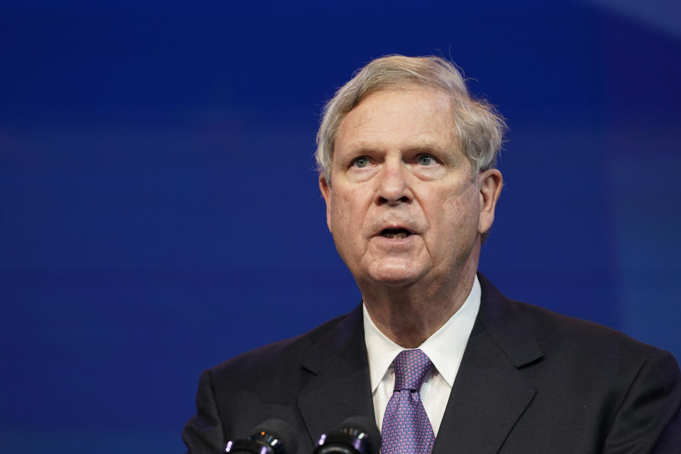 HOLD FOR STORY BY ROXANA HEGEMAN - FILE - In this Dec. 11, 2020, file photo former Agriculture Secretary Tom Vilsack, who the Biden administration chose to reprise that role, speaks during an event at The Queen theater in Wilmington, Del. Joe Biden's nomination of Vilsack to lead the Agriculture Department is getting a chilly reaction from many Black farmers who contend he didn't do enough to help them the last time he had the job. The former Iowa governor served eight years as agriculture secretary under President Barack Obama.(AP Photo/Susan Walsh, File)