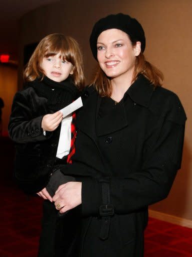 This file photo shows former supermodel Linda Evangelista with her son, Augustin, in New York, in 2009. Evangelista on Thursday clashed in court with Frenchman Francois-Henri Pinault over child support for her son fathered by the Gallic tycoon, one of France's wealthiest men