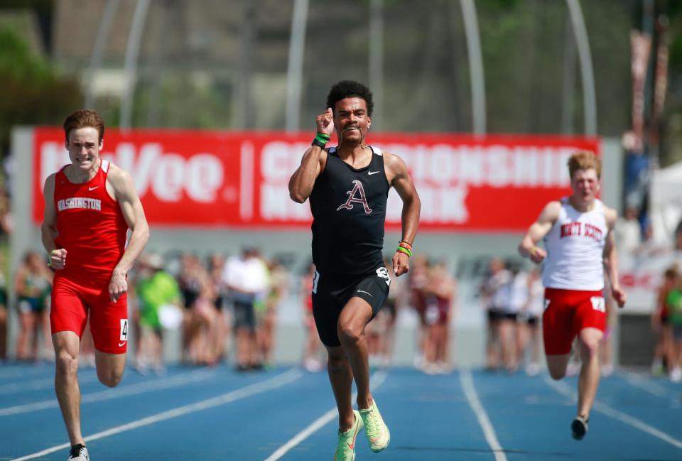 Ankeny's Tyrese Miller wins his Class 4A preliminary race in the 200 meters at the state high school track and field meet at Drake Stadium on Thursday.