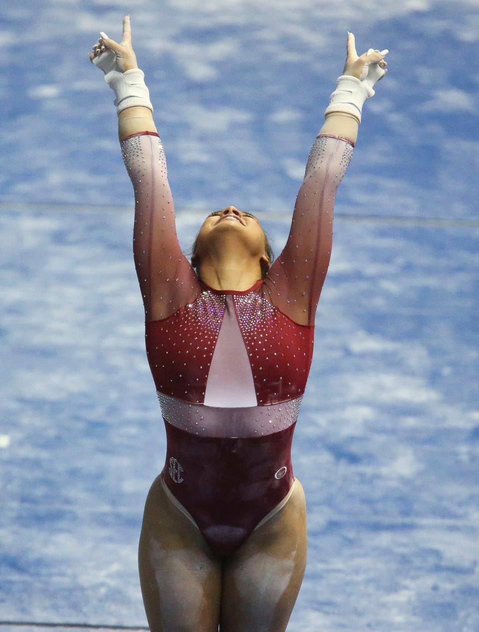 Makarri Doggette lands her dismount from the bars in the Tuscaloosa Regional's final Saturday, April 3, 2021. [Staff Photo/Gary Cosby Jr.]