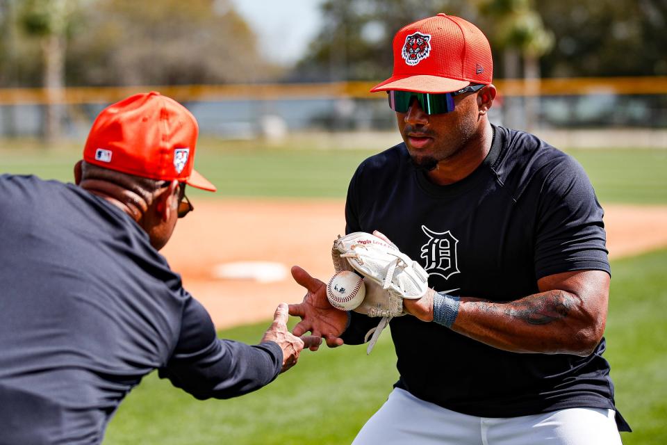 Detroit Tigers third base coach Joey Cora practices with infielder Andy Ibañez during spring training at TigerTown in Lakeland, Fla. on Friday, Feb. 23, 2024.