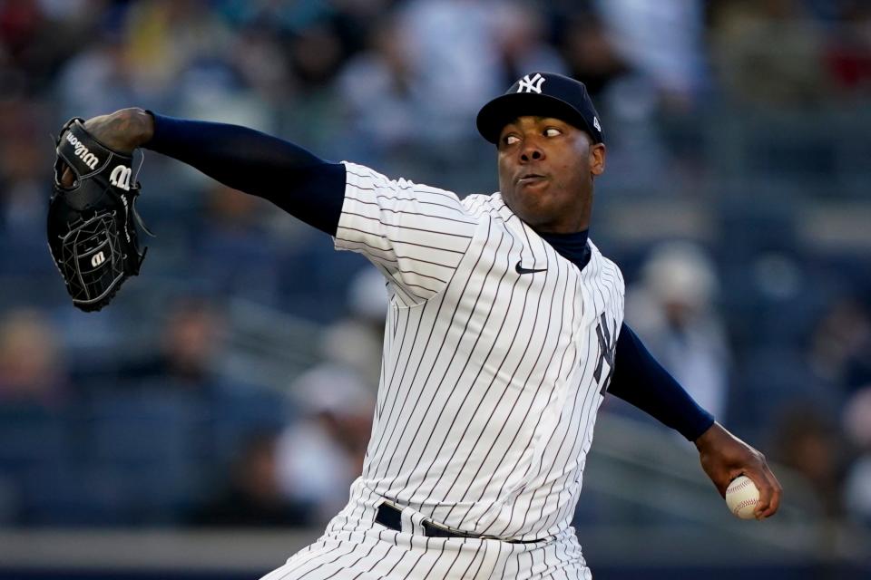 New York Yankees relief pitcher Aroldis Chapman (54) throws in the ninth inning against the Boston Red Sox, Saturday, April 9, 2022, in New York. (AP Photo/John Minchillo)