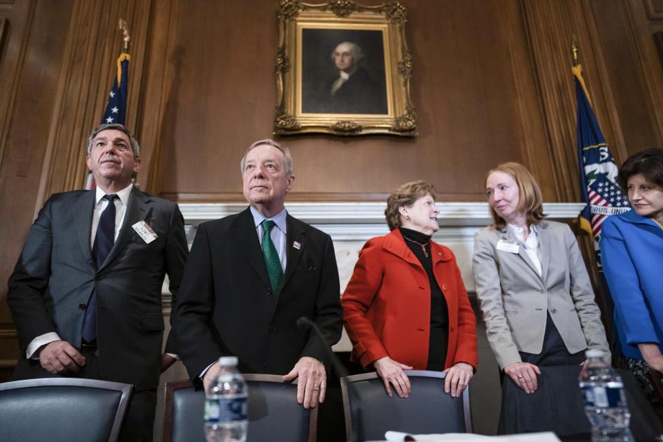 From left, European Union Ambassador Stavros Lambrinidis, Sen. Dick Durbin, D-Ill., Sen. Jeanne Shaheen, D-N.H., German Ambassador Emily Haber, and Lithuanian Ambassador Audra Plepyte join other diplomats to discuss the Russian invasion of Ukraine, at the Capitol in Washington, Thursday, March 10, 2022. (AP Photo/J. Scott Applewhite)