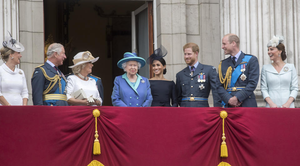 File photo dated 10/7/2018 of (left to right) Countess of Wessex, Prince of Wales, the Duchess of Cornwall, Queen Elizabeth II, Duchess of Sussex, Duke of Sussex, Duke of Cambridge, and the Duchess of Cambridge on the balcony at Buckingham, Palace where they watched a Royal Air Force flypast over central London to mark the centenary of the Royal Air Force. Issue date: Thursday September 8, 2022. The Duke and Duchess of Sussex plunged the royal family into one of the most challenging periods in modern royal history during the later years of the Queen's reign but a return to the UK for the funeral could offer Harry the chance to reunite with his family amid their shared grief and heartache for the loss of the Queen.